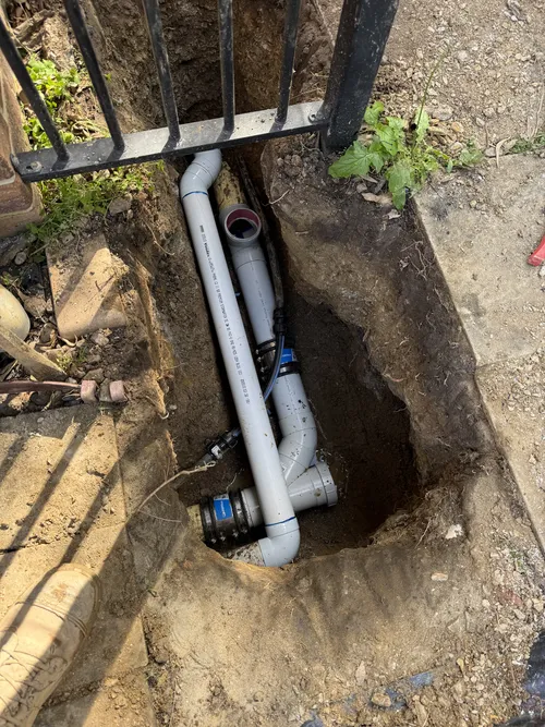 blocked sewer drain being excavated at a brisbane property